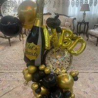 بوکت تولد HBD و بادکنک هلیومی و پولکی مشکی طلائی