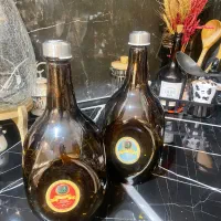 تعدادی بطری شیشه ای در دار|ظروف سرو و پذیرایی|مشهد, نیروی هوایی|دیوار