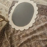 آینه سنگی دور کنگره دار