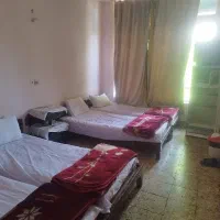 مهمان پزیر مهمان سرا هتل اتاق سویت مهمان خونه