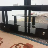 زیر تلویزیون شیشه ای