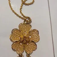 گردنبند + گوشواره با ۱ درصد روی تابلو