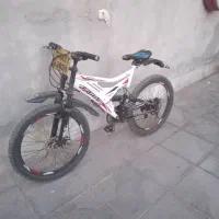 دوچرخه 24 دیسکی دنده ای معاوضه با کفش اسکیت نو