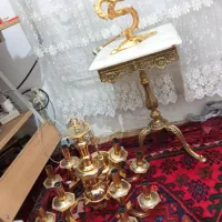 میز برنزی و لوستر 12شاخه چراغ گازی همش برنز سنگین