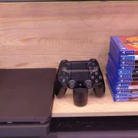 ps4 slim 1tb۱۲عدد دیسک و۶عدد بازی دیجیتالی قانونی