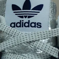 کتونی اورجینال گل سایز زرورقی کانسپت zx9000