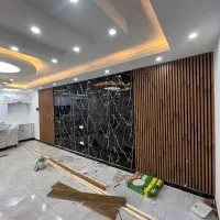 شاگرد برای کار کاغذدیواری ترمووال پارکت چمن