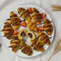 کروسان داغ و کماچ سنتی استهبان (صدرا) ‌