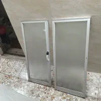 دوتا پنجره و چهارچوبه در حال المنیومی