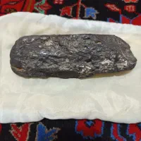 مشکوک به شهاب سنگ|کلکسیون اشیاء عتیقه|مهاجران, |دیوار