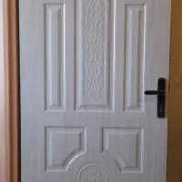 فایل چوبی و یک لنگه در چوبی و صندلی فلزی