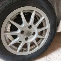رینگ 11پر و لاستیک 205 کره ای و چراغ عقب اسپرت