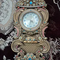 ساعت دیواری آونگ دار