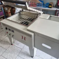 دستگاه شیرینگ کابینی شرینک حرارتی پرس پک بسته بندی