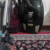 جارو برقی و میز تلوزیون شیشه ای چوبی