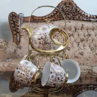 ست قوری و فنجان و نعلبکی چایخوری چینی کاملا نو