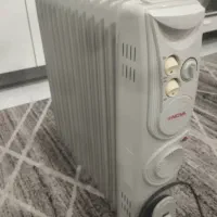 بخاری برقی. شوفاژ و رادیاتور برقی.|بخاری، هیتر، شومینه|محمدیه-قزوین, |دیوار