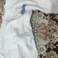 فروش لباس کاراته همراه با کمربند سبز