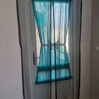 پرده مجیک مناسب دربالکن در ورودی پذیرایی