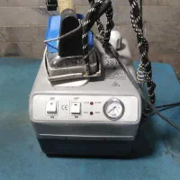 اتو کار و بسته بند خانم پوشاک بچه گانه