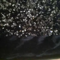 پارچه پولک دوزی مشکی روی مخمل مشکی و پر کار