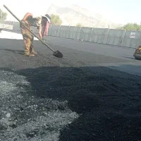 کارگر آسفالتکار میخام