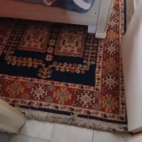 دوعدد قالیچه دستباف و ماشینی