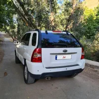 اسپورتیج مدل ۲۰۱۰ سفید فول یک لکه رنگ