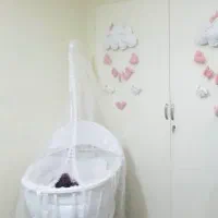 گهواره کنار مادر