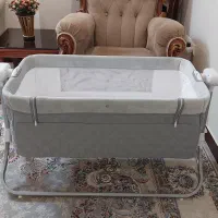 گهواره برقی و تخت کنار مادرaxes|تخت و صندلی بچه|ری, دولتآباد|دیوار