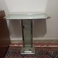 پایه زیر اینه و شمعدان