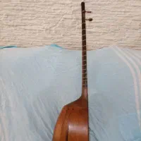 تنبور پاشنه ای از چوب توت|سازهای سنتی|کنگاور, |دیوار