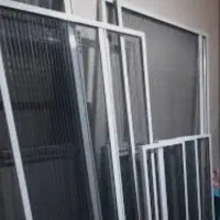 درب وپنجره دوجداره و توری پلیسه درسرتاسرتهران