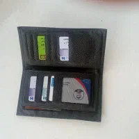 کیف پول وکارتریج شده که شامل گواهینامه وکارتها