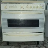 اجاق گاز تاکنو گاز سفید لعابی 5 شعله