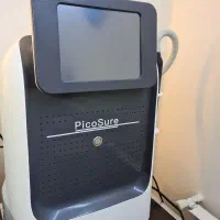 پاک کردن تتو با دستگاه کیوسوئیچ