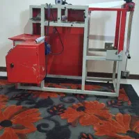دستگاه رول کن سفره یکبار مصرف تک رول
