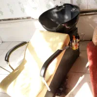 سرشور خوابیده آرایشگاه