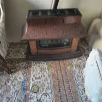 بخاری خیلی سالم و تمیز طرح شومینه مهیا شعله