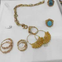 طلاهای نوواستفاده نشده 500بالای تابلو وبقیه 200