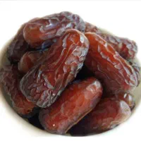 کارگر ساده در جهت حمل خرما به خانوار