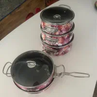 ست قابلمه ۹ پارچه طرح گلدار در حد نو