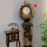 ساعت و آینه شمعدان