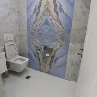 کاشی کاری چسبی و دوغابی ورفع نم حمام وتوالت