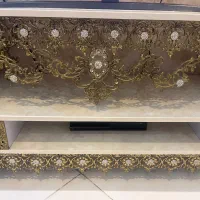 ساعت ایستاده و‌ میز تلویزیون برنز