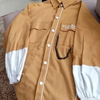 تعداد زیادی لباس متنوع|لباس|میانه, |دیوار