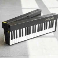پیانو تاشو کونیکس pj88c