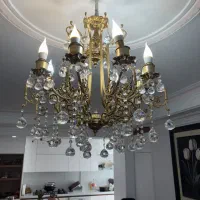 یک عدد لوستر ۸ شاخه برنجی کاملا سالم و براق