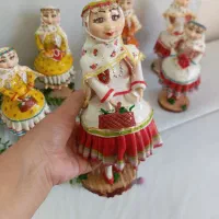 مجسمه دختر کرمانج