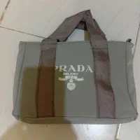 کیف طوسی رنگ یه زیپ
